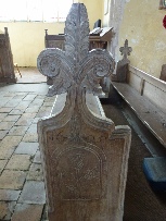 Old carved pew in Thompson Church.