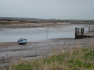 Jetty and boat at Overy Staithe.