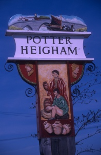 Village sign of Potter Heigham.