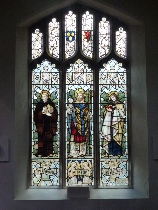 Stained glass window in Holt Church. 