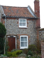 Flint covered cottage in North Repps.