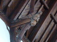 Carved angel in Fakenham Church. 
