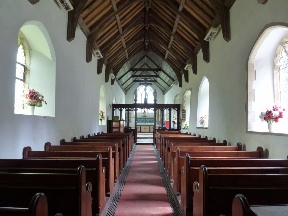 The aisle in the church at Burgh St Peter.