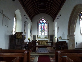 The aisle and altar in Woodton church. 