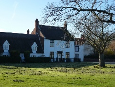 House on the green in Martham. 