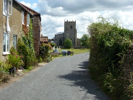 View of the church from Wiveton village.