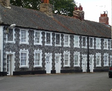 Stone buildings in Holt.